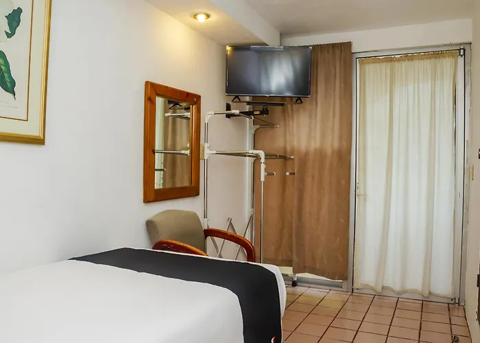 Hotel Capital O Dos Mares,