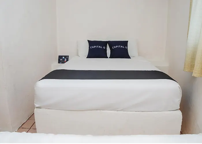Hotel Capital O Dos Mares,