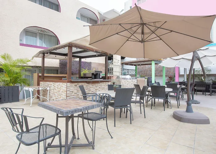 Hotel Capital O Dos Mares,